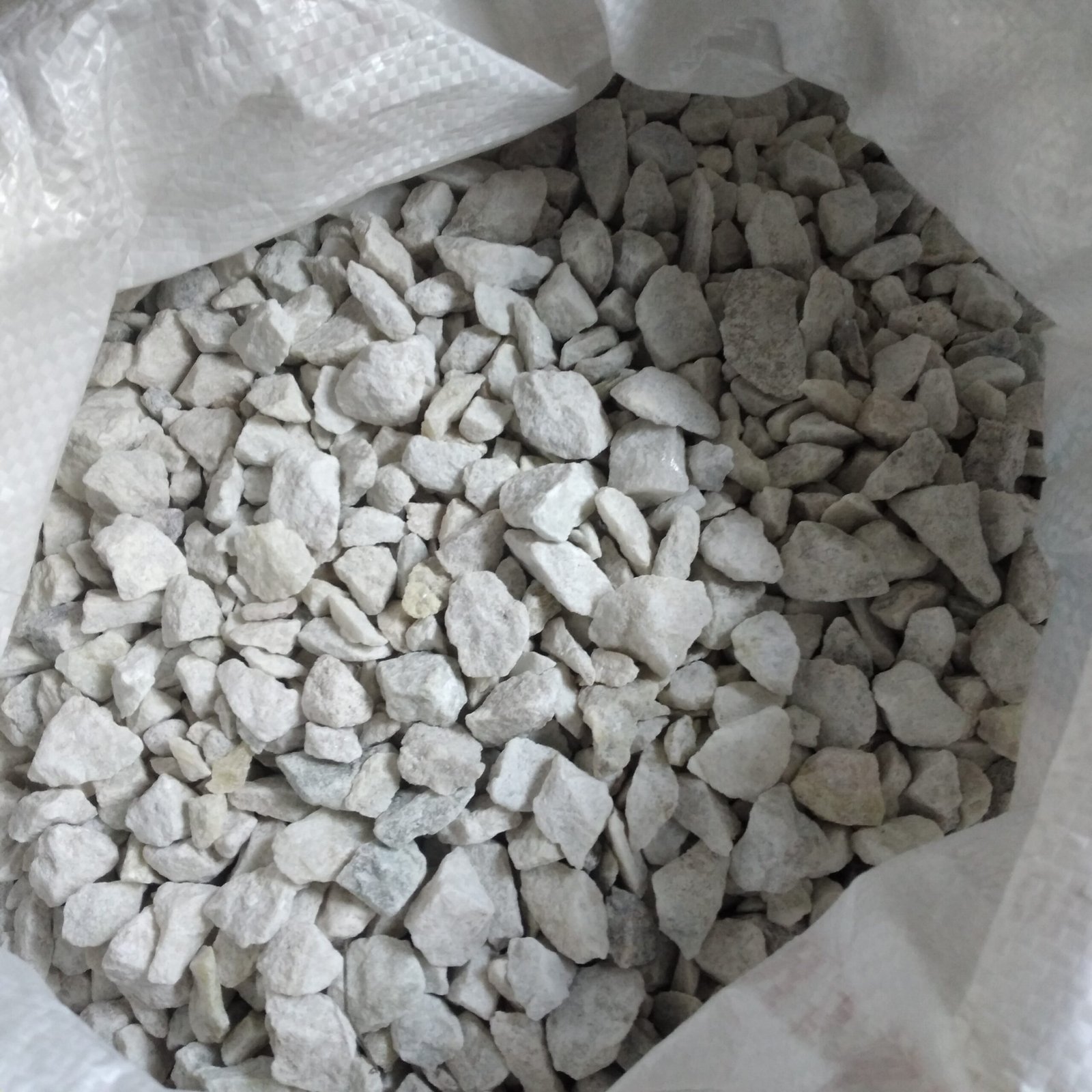 Bolsa piedra blanca x 25 kg – Vivero Onda Verde